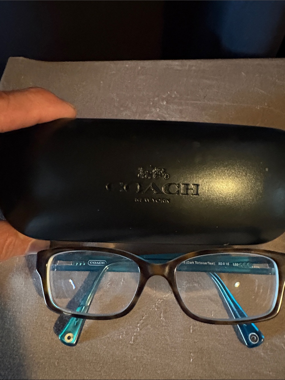 Coach women’s Black Frames with Teal Temple Accents